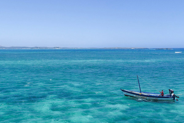 Meeting local fishermen during an Emerald Sea excursion